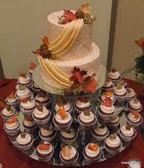 This Is A Fall Themed Cupcake Wedding Tower There Are 80 Cupcakes And A Larger Top Cake To Feed Fall Wedding Cupcakes Wedding Cupcakes Wedding Cake Pictures