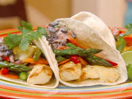 Food network invites you to try this fish tacos with chipotle cream recipe from ellie krieger. Spotlight Recipe Fish Tacos Food Network Healthy Eats Recipes Ideas And Food News Food Network