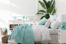 Lofted beds provide just enough space for a cozy nook. Vacation Everyday In Your Very Own Beach Themed Bedroom