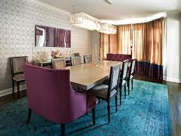 Our roomy and remarkable dining armchairs are the perfect crowning touch for your dining room, and we have both upholstered host chairs and wooden dining armchairs in a wide range of styles. Dining Room With Bold Turquoise Rug Purple Tufted End Chairs Hgtv