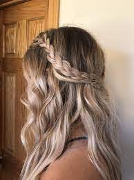 Curls on this hairstyle should extend up to the hair edges. Braided Half Up Half Down Hairstyle Promhairstyleshalfuphalfdown Prom Hair Down Wedding Hair Down Down Hairstyles