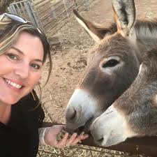 Senior women's football coach renews commitment