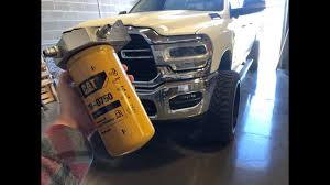 I attached a picture of the location of the filter for you to view. Cat Fuel Filters On 2019 5th Gen 6 7 Cummins Full Install Youtube