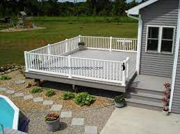 A bench is a perfect deck hand railing idea since it gives a natural place to congregate. Schmidt Fence Deck Deck Paint Deck Colors Painted Patio