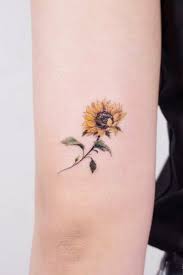 This design does make lots of sense when you think about it since sunflowers thrive in huge fields. Get Yourself Inspired With Our Sunflower Tattoo Ideas