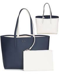 Maybe you would like to learn more about one of these? Sacs Fourre Tout Et Cabas Lacoste Pour Femme Jusqu A 20 Sur Lyst Fr