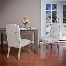Capture the enchanting aura cast by red rock and turquise stone in home furnishings and decorative accessories inspired by the american southwest. Beige Printed Fabric Dining Chairs Set Of 2 Overstock Com