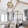Anchor the space with a canopy bed. 3