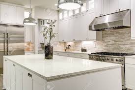Jul 01, 2018 · divine! Gourmet Kitchen Features White Shaker Cabinets With Marble Countertops Stone Subway Tile Backsplash Double Door Stainless Steel Refrigerator And Gorgeous Kitchen Island Northwest Usa Stock Photo Picture And Royalty Free Image Image