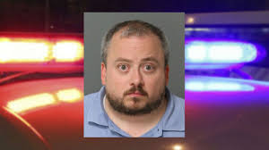 Apex man charged for peeping