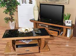 The entertainment stand supports up to a 65 inch television and/or 75 pounds while two cabinets organize movies, games and more. This Mr Vuma Home Center Furniture And Electronics Facebook