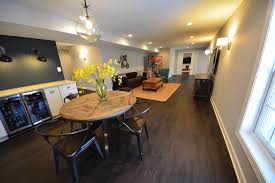 Keep in mind that an installation over tile should include filling in any grout lines and uneveness. Considering The Right Basement Flooring Hupehome Basement Flooring Basement Flooring Options Finishing Basement
