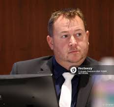 Zach Wittchow, Waukesha Assistant District Attorney cross examines Waukesha  Detective Steven Guth, a witness for the prosecution