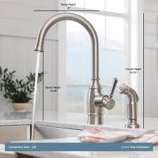 The spacious spout enhances the curvature of the faucet creating a polished some faucets have an automatic retractable head that will coil back in once you release it from your hands. Moen Noell Single Handle Standard Kitchen Faucet With Side Sprayer In Spot Resist Stainless 87506srs The Home Depot