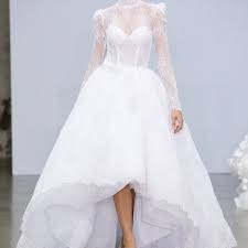 Imagine the beautiful traditional silhouette of a long bridesmaid gown from one angle. 19 High Low Wedding Dresses We Love