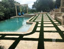 Paver stone walkways generally require a gravel and sand base layer with little gaps between each mow the grass before installing the walkway to make it easier to access the sides of the pavers. Installing Artificial Grass Between Pavers Sgw