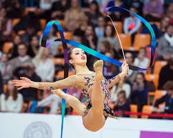 Hoop, ball, clubs, ribbon or rope. What S The Difference Between Rhythmic And Artistic Gymnastics Britannica