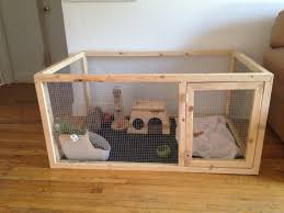 This Is The Bunny Cage My Boyfriend And I Made For My Two Baby Holland Lops The Bottom Is A Crate Pan Bought Indoor Rabbit Indoor Rabbit Cage Diy Rabbit Cage