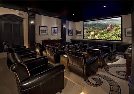 A Home Theater That Provides Enough Room For Everyone To Sit Back And Enjoy A Film Home Theater Home Theater Seating Home Home Theater Design