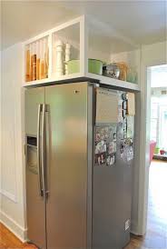 Ideas For Using That Awkward Space Above The Fridge Kitchen Remodel Small Kitchen Storage Space Kitchen Design