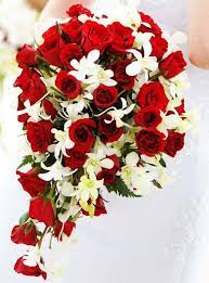 Red and white roses, peonies, and ranunculus make this bouquet shine. Teardrop Red Roses And White Thai Orchids Weddings In Thailand Red Rose Bridal Bouquet Red Rose Wedding Red Rose Bouquet Wedding