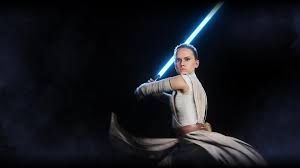 rey with a lightsaber wallpaper from