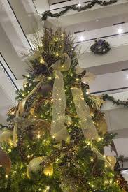 Here's 12 great ideas to have the best decorated office in the building! Why Start Planning Commercial Christmas Decorations Now Natura Enhancing The Built Environment Indoor Office Plants Outdoor Landscapes Green Wall Systems Holiday Decor Commercial Disinfection