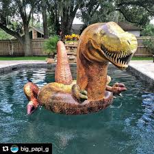 There S Now A Giant T Rex Pool Float And Yes He Even Has Tiny Little Arms Pool Floaties Summer Pool Floats Inflatable Pool Floats
