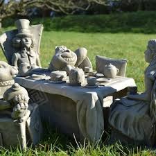 Maybe you would like to learn more about one of these? Alice In Wonderland Tea Party Stone Garden Statue Etsy