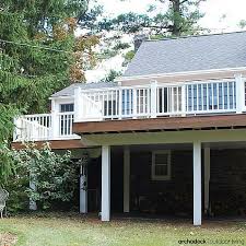 Diagram of our ipe decking tiles from the side, top & bottom. Second Story Ipe Deck Spans Nearly The Length Of The Back Of The Home Creating A Spacious Outdoor Space The Under Deck Is Pallet Patio Decks Backyard Patio