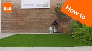 One way to install artificial turf over concrete is with glue. How To Lay Artificial Grass Youtube
