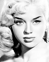 In her time Diana Dors was one of the UK's most photographed ladies. From  studio portraits to press photographs to personal family photographs. One  of my favourite photographs is one of Diana