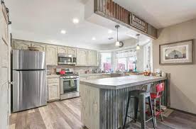 Because of its width, both the drawers and shelves behind the doors are about half the depth as normal, but still useful. Corrugated Metal In Kitchens Design Gallery Designing Idea