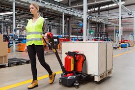 Locate the pallet jack control on the handle. How To Use A Electric Pallet Truck Safely