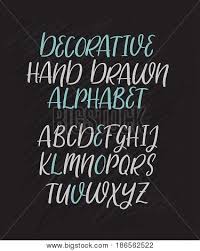 Handwritten brush style modern calligraphy cursive font with flourishes. Modern Calligraphy Vector Photo Free Trial Bigstock