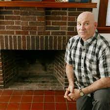 Wide slate tiles and a revolving furnace offer a bright, reliable, and sleek look to this gas chimney. How To Replace A Hearth With Slate Tile This Old House