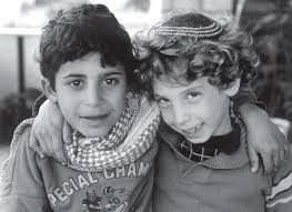 Palestinian and Israeli boys pose for a photo together during the First  Intifada, 1988. It was printed that year as a full-page New York Times ad,  with the caption “What's Right With
