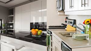 Art deco kitchen design with an extended countertop as a dining table luxurious dark gray kitchen design with a kitchen island extended countertop and exclusive lighting 5 Best Kitchen Countertops Design Ideas Top Kitchen Slab Materials Architectural Digest India