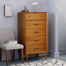 A tall, narrow profile makes this classic dresser essential for smaller spaces. Mid Century 5 Drawer Dresser
