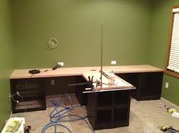 Diy Office With T Shaped Countertop And Built In Cabinets Office Furniture Diy Diy Office Home Office Furniture
