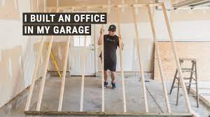 A couple of air mattresses set up on the floor? I Built An Office In My Garage And Still Have Room To Park Our Van Youtube