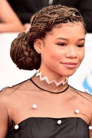 The 18 Prettiest Celeb Inspired Chignons Box Braids Hairstyles Box Braids Hairstyles For Black Women Braided Hairstyles Updo