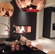 Black Feature Wall Love The Copper Light Shades And Home Accessories Copper Decor Living Room Copper Living Room Copper Dining Room