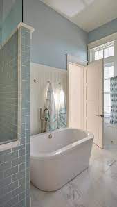 Gray and white marble is an elegant element in any bathroom. White And Blue Bathroom With White Marble Grid Floor Tiles Cottage Bathroom