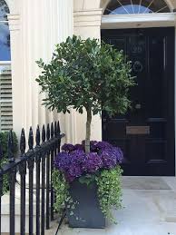 Flowers can include yellow mums, ornamental kale, purple sage flowers, red or orange berries from the viburnum or the bittersweet and a bit of moss. 40 Front Door Flower Pots For A Good First Impression