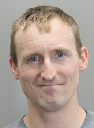 FedEx employee who 'shot dead' non-profit founder as he was lying in bed  next to wife is pictured