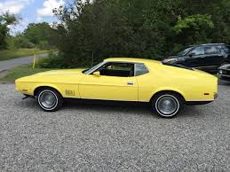 Image result for Bright Yellow 1973 Colt