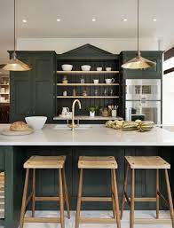 Hunter Green Kitchen Cabinets With A Brass Sink Faucet Pendant Lights And Hardware Atop Carrera Mar Green Kitchen Cabinets Classic Kitchens Dark Green Kitchen