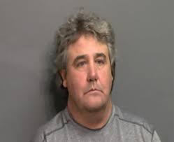 Armed man arrested after standoff at Tommy's Corner