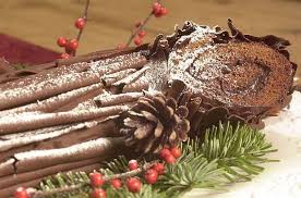 Buche De Noel Or Chocolate Yule Log Is A Chocolate Cake Filled With A Flavored Whipped Cream Rolled And Fr Winter Desserts Christmas Snacks Christmas Baking
